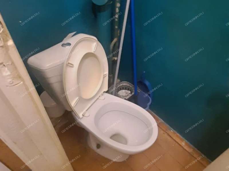 комната в доме 15а на улице Дружаева